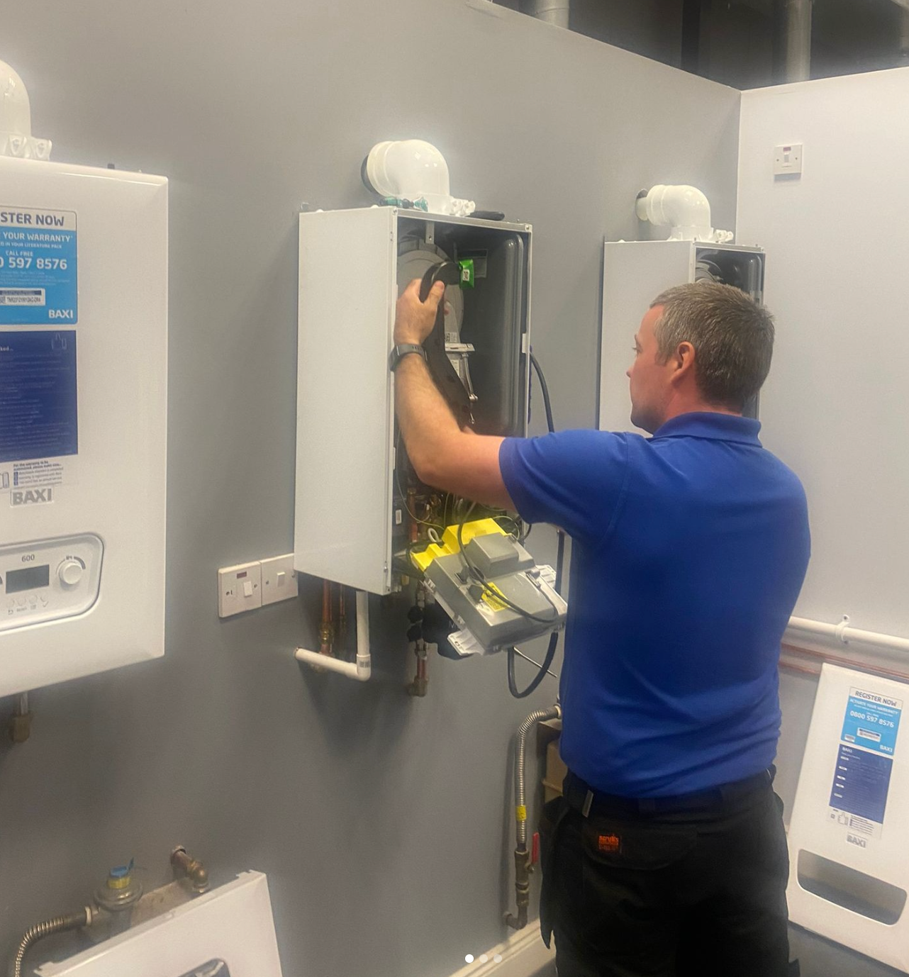 Glenmac Heating engineer working on a home heating system